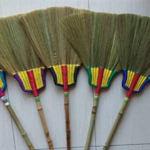 Broom manufacturing process using natural grass materials