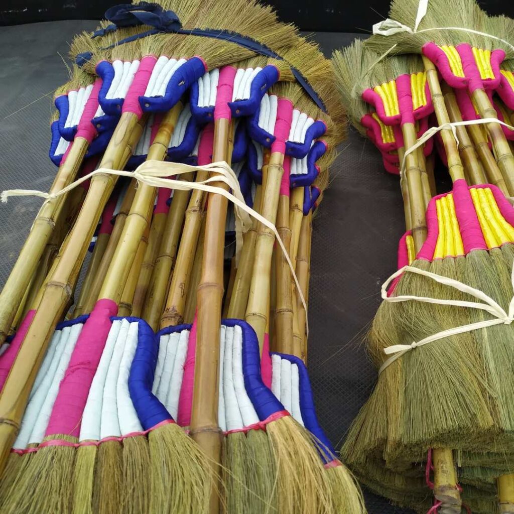 Broom manufacturing packaging process for international shipment