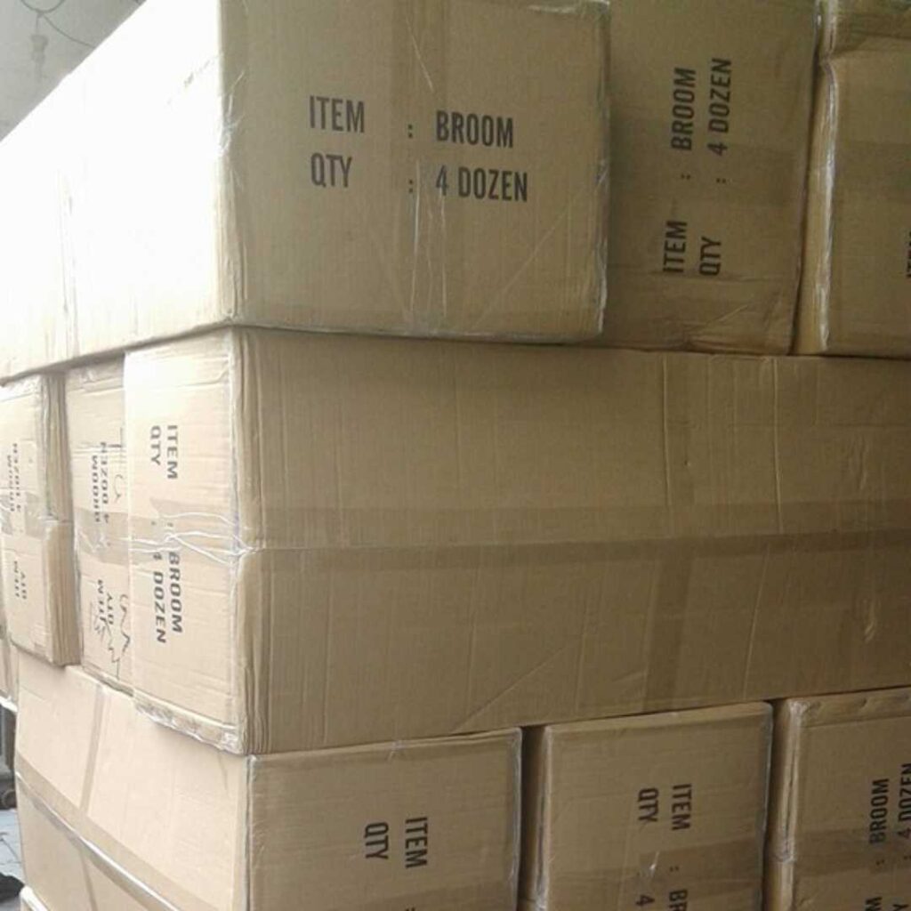 Palm fiber broom packaging for export shipment